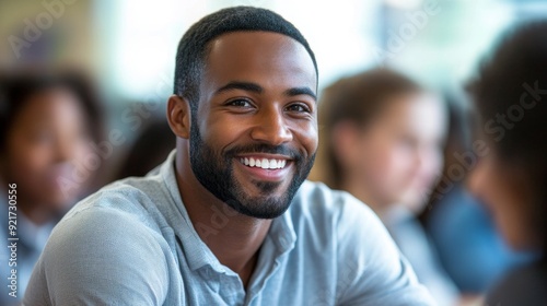 Happy young man smiling.