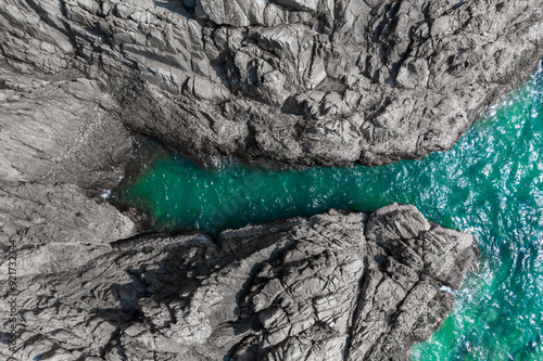 Aerial drone top view of ocean beautiful rocky coast, close up. #921732344