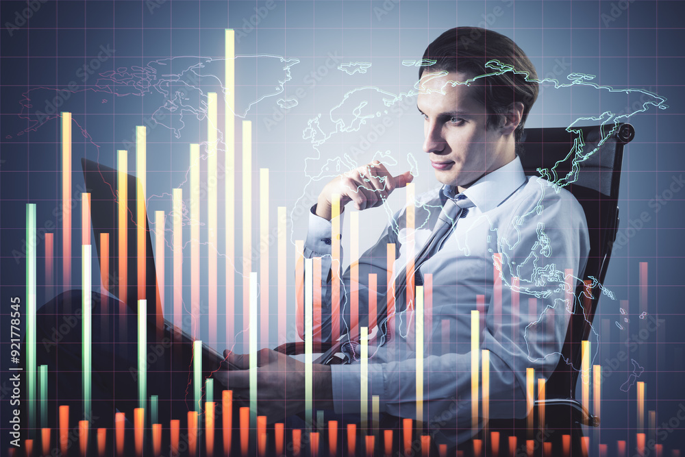 Attractive young businessman sitting and using laptop with downward forex chart on blurry background. Financial recession and crashing market concept. Double exposure. Attractive young businessman sitting and using laptop with downward forex chart on blurry background. Financial recession and crashing market concept. Double exposure.