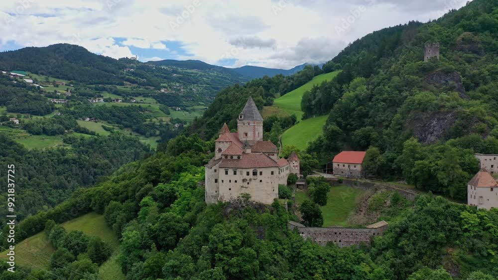 Aerial view of Castle on the rock, vineyards and winery on a sunny summer day Bolzano Italy Aerial view of Castle on the rock, vineyards and winery on a sunny summer day Bolzano Italy