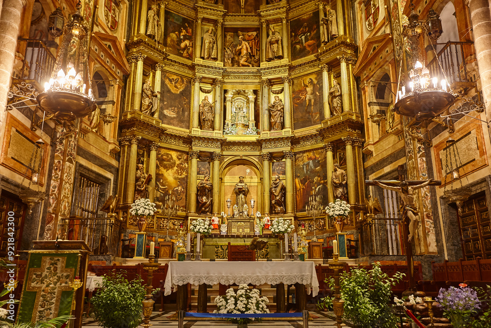 Baroque Guadalupe church interior. Decorated altar. Caceres, Extremadura. Spain