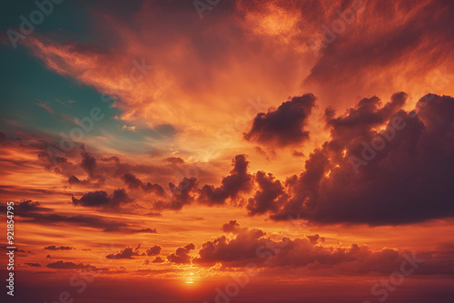 Spectacular sunset evening sky and cloud orange background. Vintage picture.