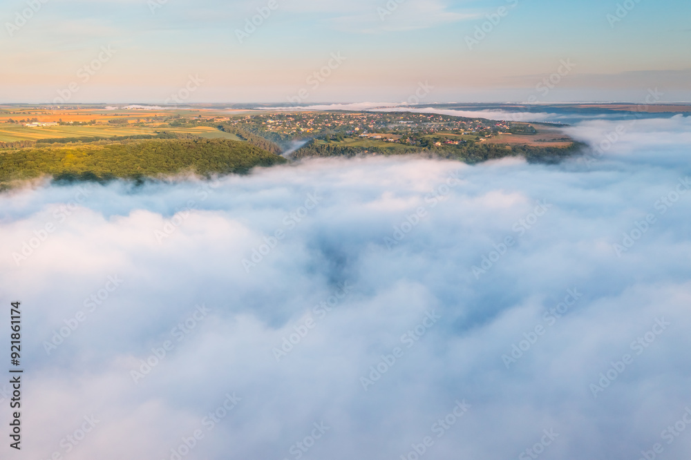 Majestic scene of plain in the fog from a bird's eye view. Majestic scene of plain in the fog from a bird's eye view.
