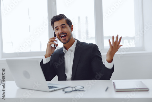Man computer smile phone talk office businessman