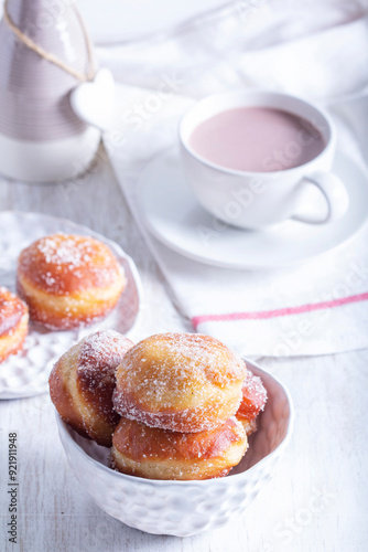 Obraz na płótnie Donuts with sugar and cinnamon served with cocoa. Traditional dessert for Carnival. w salonie