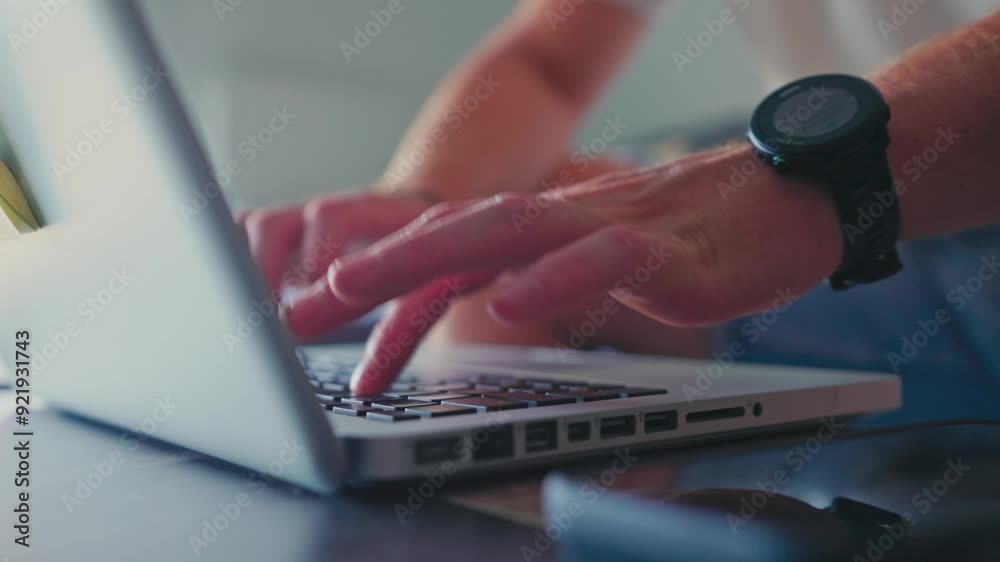 Close-Up of Hands Typing on Laptop