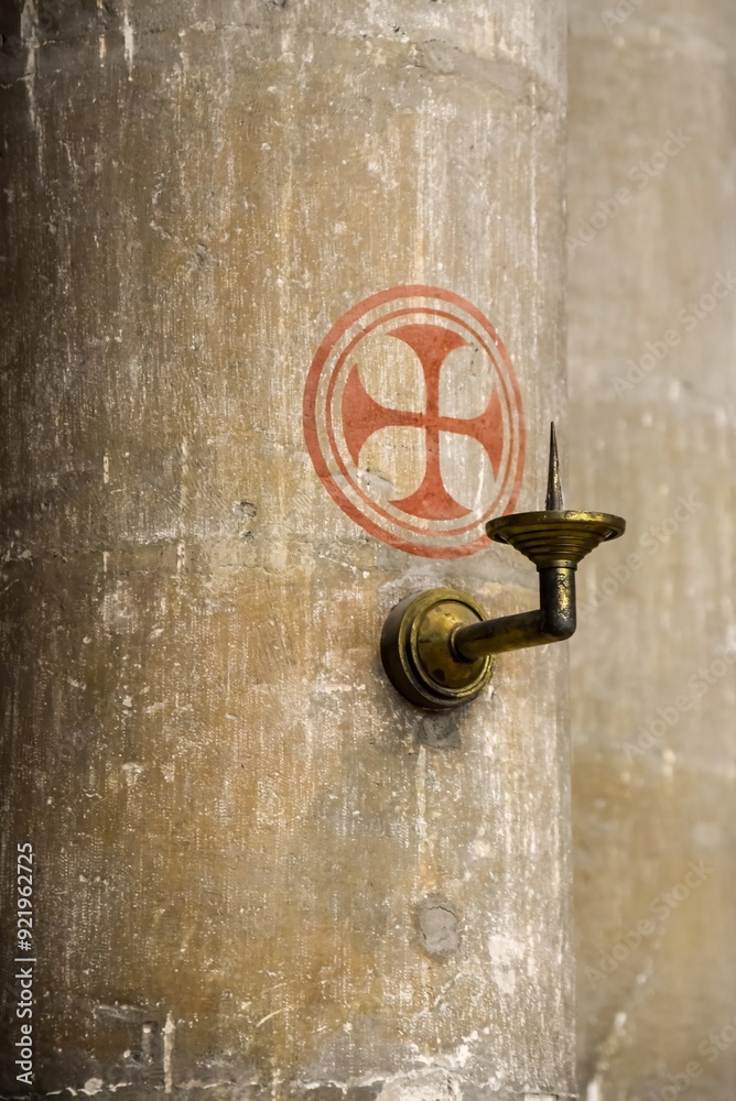 old candle holder inside the cathedral in Reims