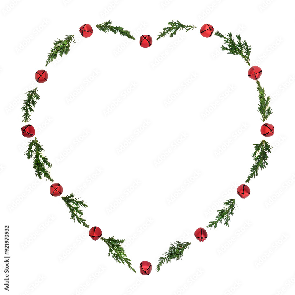 Christmas heart shape juniper and red bell bauble wreath on white background. Minimal symbol of love festive design for greeting card, logo, gift tag, invitation. Christmas heart shape juniper and red bell bauble wreath on white background. Minimal symbol of love festive design for greeting card, logo, gift tag, invitation.