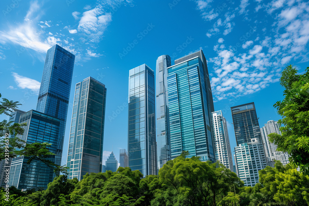 Skyscrapers Viewed from Below with Blue Sky and White Clouds Skyscrapers Viewed from Below with Blue Sky and White Clouds