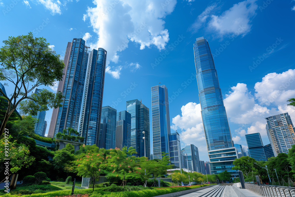 Skyscrapers Viewed from Below with Blue Sky and White Clouds Skyscrapers Viewed from Below with Blue Sky and White Clouds