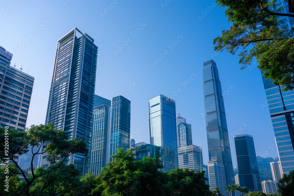 Skyscrapers Viewed from Below with Blue Sky and White Clouds Skyscrapers Viewed from Below with Blue Sky and White Clouds