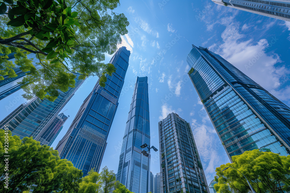 Skyscrapers Viewed from Below with Blue Sky and White Clouds Skyscrapers Viewed from Below with Blue Sky and White Clouds