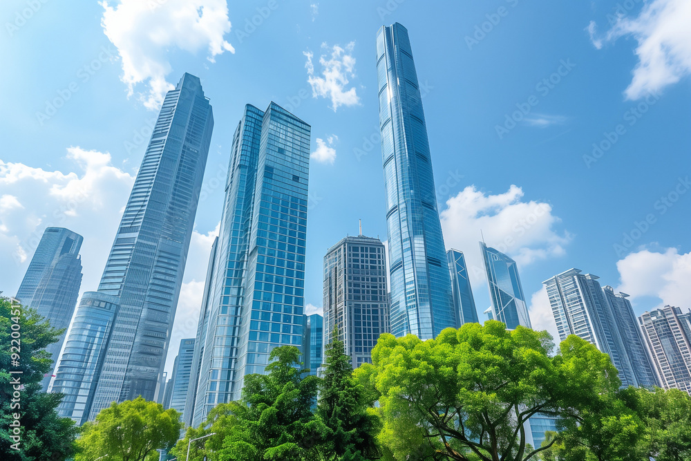 Skyscrapers Viewed from Below with Blue Sky and White Clouds Skyscrapers Viewed from Below with Blue Sky and White Clouds