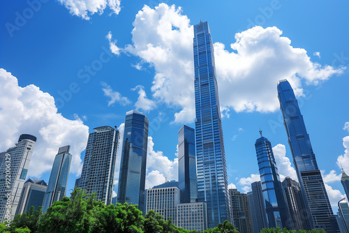 Skyscrapers Viewed from Below with Blue Sky and White Clouds