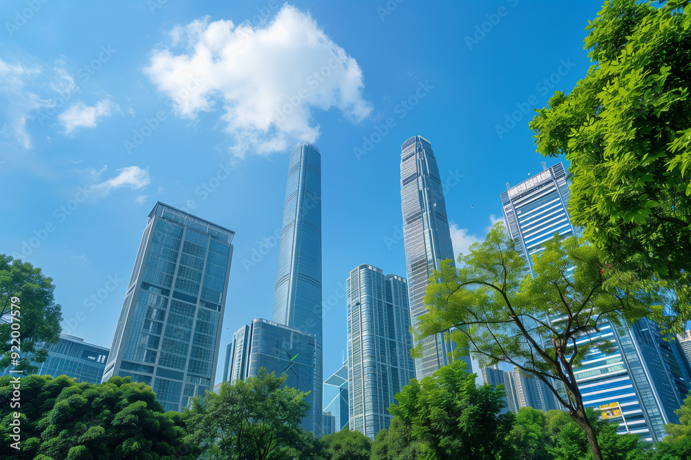 Skyscrapers Viewed from Below with Blue Sky and White Clouds Skyscrapers Viewed from Below with Blue Sky and White Clouds