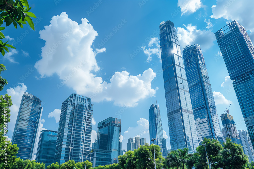 Skyscrapers Viewed from Below with Blue Sky and White Clouds Skyscrapers Viewed from Below with Blue Sky and White Clouds