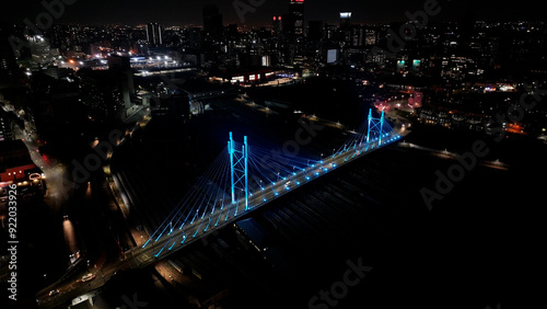 Mandela Bridge At Johannesburg In Gauteng South Africa. Night Scape Town. Illuminated Cable Stayed Bridge. Johannesburg At Gauteng South Africa. Landmark Bridge. Colorful Skyline.