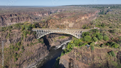 Victoria Falls Bridge At Victoria Falls In Matabeleland North Zimbabwe. Landmark Bridge. Zambezi River Landscape. Victoria Falls At Matabeleland North Zimbabwe. Southern Africa. Tourism Travel. photo