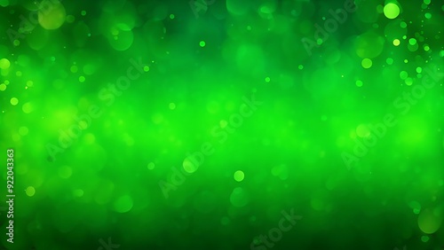 Bokeh green lights in a gradient blur effect background. Abstract sparkling backdrop for festive design and print