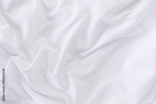 White fabric. luxurious white fabric texture background. Creases of satin, silk and cotton.