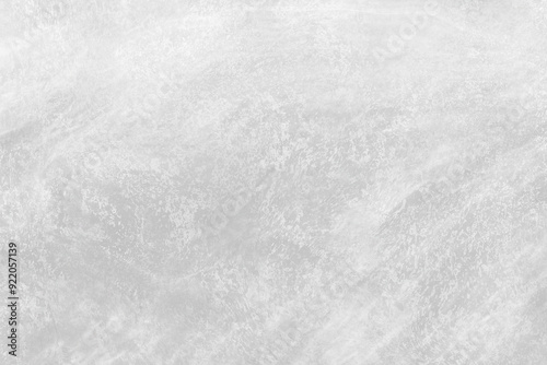 White Concrete Texture, Subtle Swirls of Grey and White, A minimalist backdrop of smooth, textured concrete. This image captures the understated beauty of natural materials.