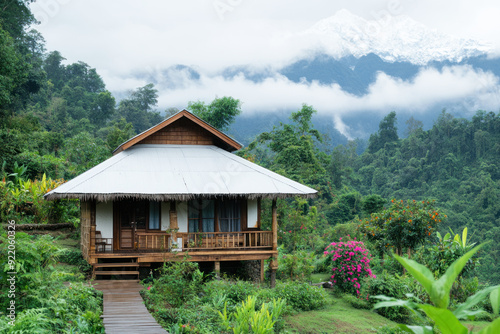 Cozy traditional bamboo bungalow by lush jungle, natural living