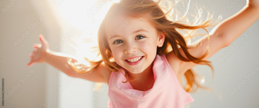 Portrait of a Happy Little Girl in Pink Tank Top With Blonde Hair Blowing in the Wind Portrait of a Happy Little Girl in Pink Tank Top With Blonde Hair Blowing in the Wind