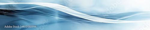 Abstract blue and white wavy background with soft light.