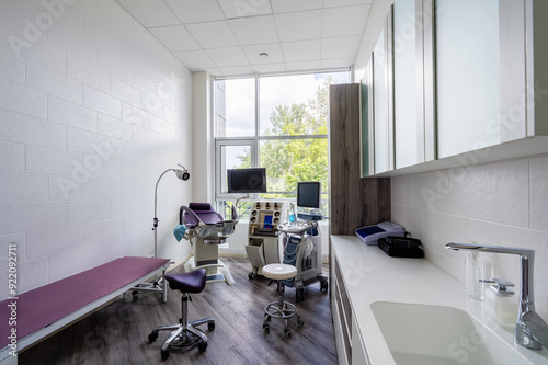 Valokuva Interior of hospital room with gynecologist's chair and ultrasound machine in a gynecologist clinic
