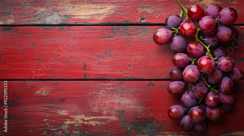  a compelling image of a red grape on an old blue wood table