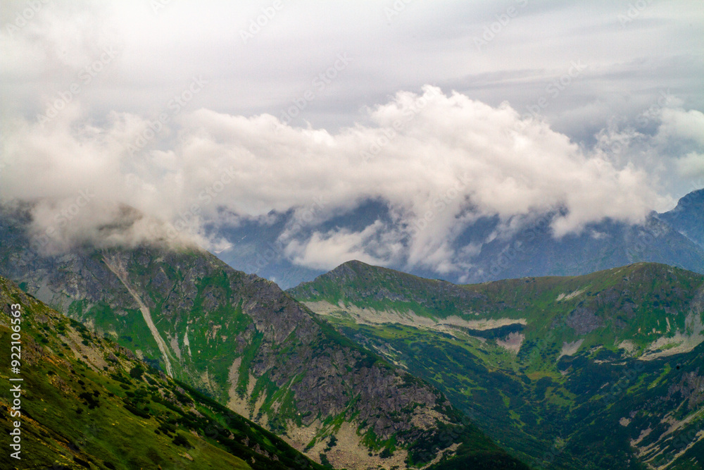 Beautiful mountain landscape with clouds and fog. Beautiful mountain landscape with clouds and fog.