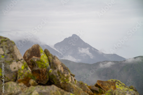 Beautiful mountain landscape with clouds and fog. 