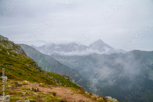 Beautiful mountain landscape with clouds and fog. 