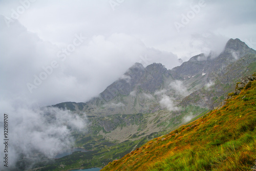 Beautiful mountain landscape with clouds and fog. 