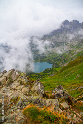 Beautiful mountain landscape with clouds and fog. 