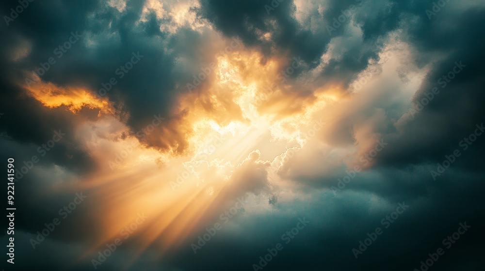 A dramatic sky with the sun partially obscured by dark, billowing storm clouds. Rays of sunlight break through in beams, creating a striking contrast between the dark clouds and the bright light. A dramatic sky with the sun partially obscured by dark, billowing storm clouds. Rays of sunlight break through in beams, creating a striking contrast between the dark clouds and the bright light.