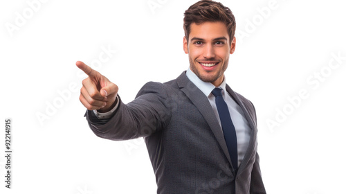 Confident businessman in a suit smiling and pointing positively, isolated on a white background.