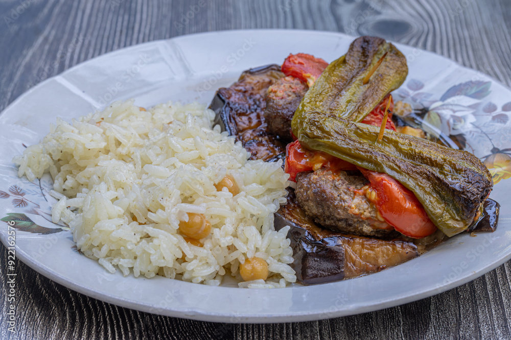 Traditional delicious Turkish food; Kofte kebab wrapped in eggplant (Turkish name; Islim - islim kebabi or kurdan kebabi)