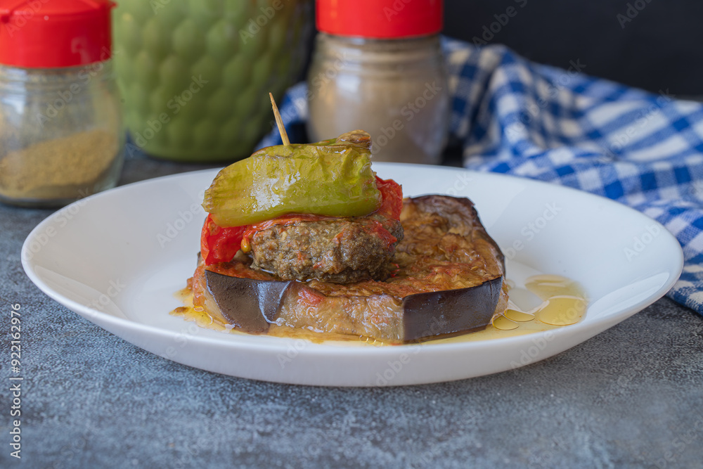 Traditional delicious Turkish food; Kofte kebab wrapped in eggplant (Turkish name; Islim - islim kebabi or kurdan kebabi)