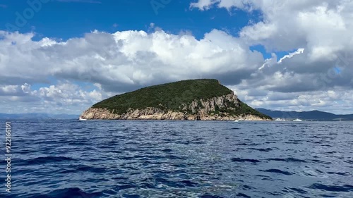 View on Figarolo island from sea with blue waters at Italy's Sardinia