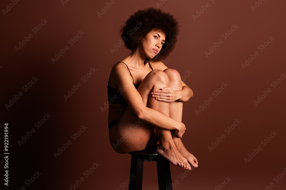 Naklejka premium Photo of happy dreamy lady underwear lingerie enjoying self acceptance emtpy space isolated brown color background