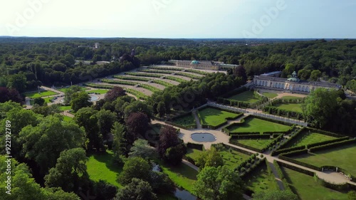 Wallpaper Mural Sunny summer day Potsdam sanssouci Palace showing the beautiful green gardens and surrounding area. Great aerial view flight wide orbit overview drone Torontodigital.ca