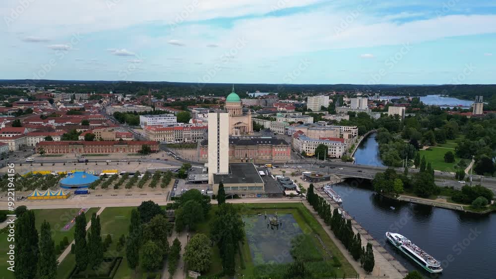 Potsdam city center with red roofs and river Havel surrounding it on a sunny and cloudy day. Perfect aerial view flight panorama overview drone Potsdam city center with red roofs and river Havel surrounding it on a sunny and cloudy day. Perfect aerial view flight panorama overview drone