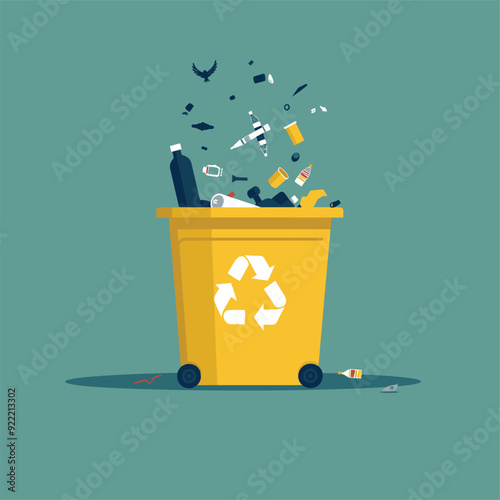 Overflowing recycling bin with scattered items