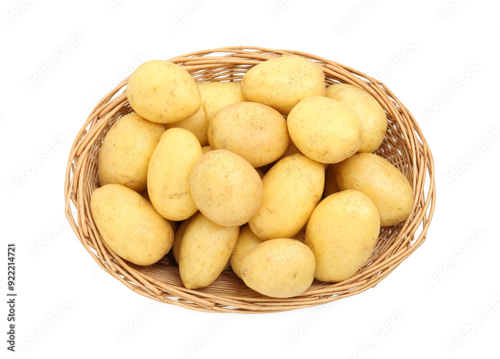 Young potatoes in wicker basket isolated on white, top view Young potatoes in wicker basket isolated on white, top view