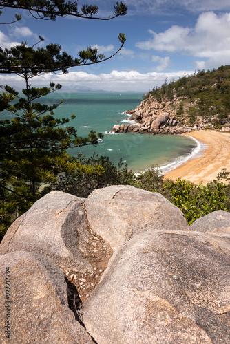 a close up of a rock next to a body of water at Arthur Bay on Magnetic Island