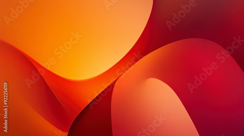 A vibrant abstract design featuring smooth curves in warm orange and red hues.