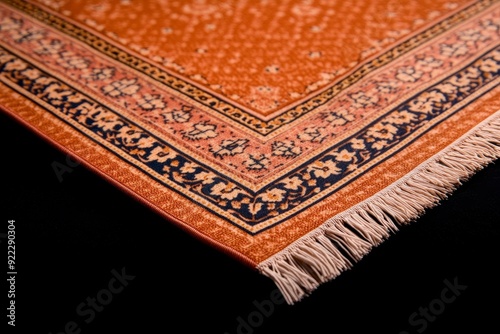 Close-up of decorative patterned area rug corner