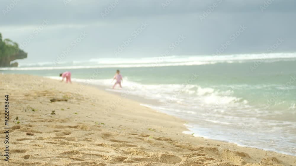 Tropical Beach Fun – Blurred Children, Turquoise Water, and Coastal Debris on a Sunny Morning – 4K Tropical Beach Fun – Blurred Children, Turquoise Water, and Coastal Debris on a Sunny Morning – 4K