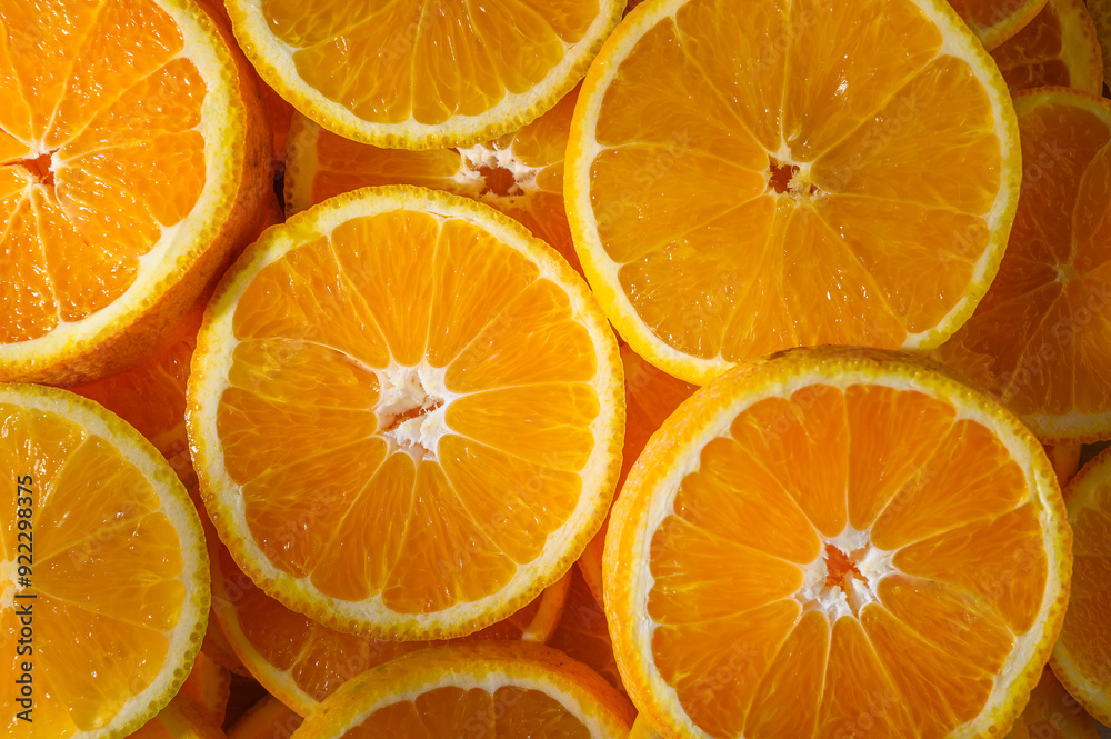 Fototapeta premium a group of oranges cut in half